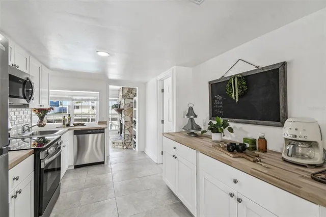 a front view of a house with sitting area