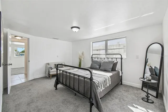 an aerial view of a pool patio swimming pool and ocean view