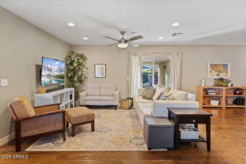 a living room with furniture and a table