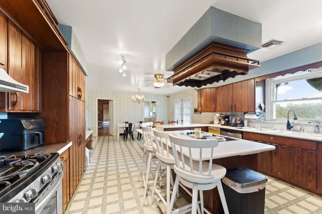 a view of a room with a wooden floor