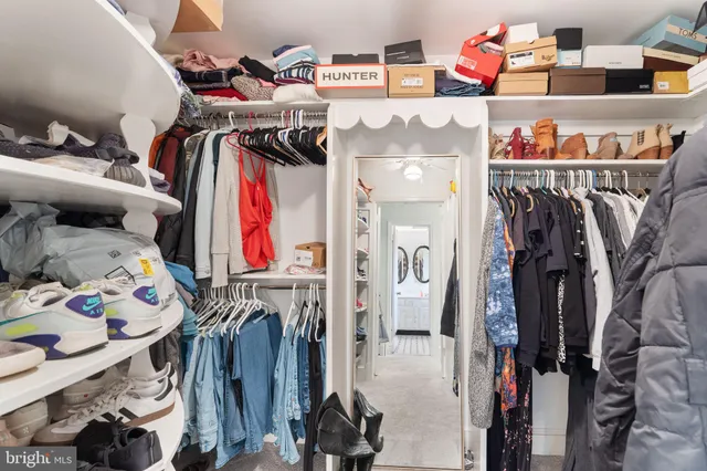 a bathroom with a sink vanity and a mirror