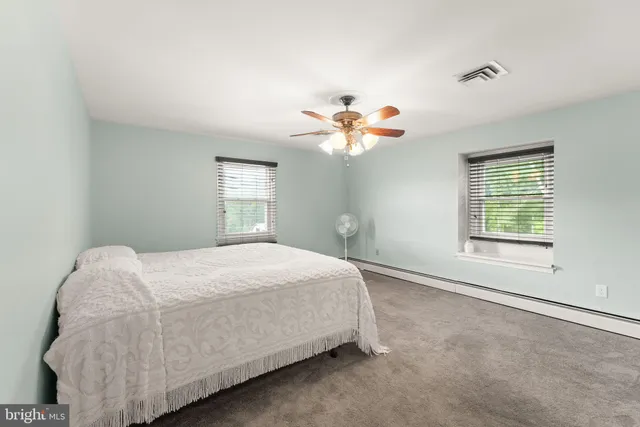 a view of an outdoor space and basketball court