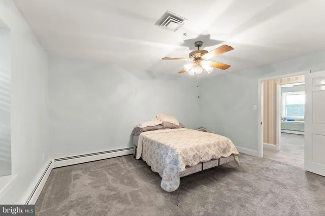 a view of a city with lush green forest