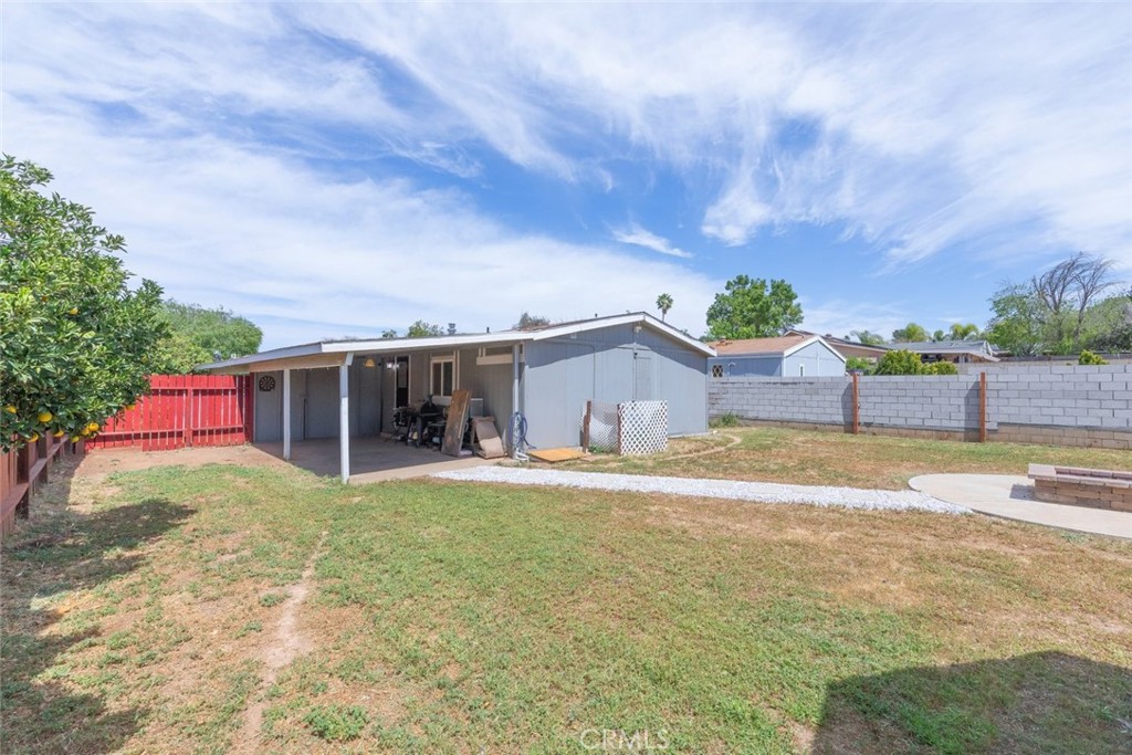 24799 Split Rail Road Wildomar, CA 92595 - Photo 18 of 37 a view of a house with a yard and garage