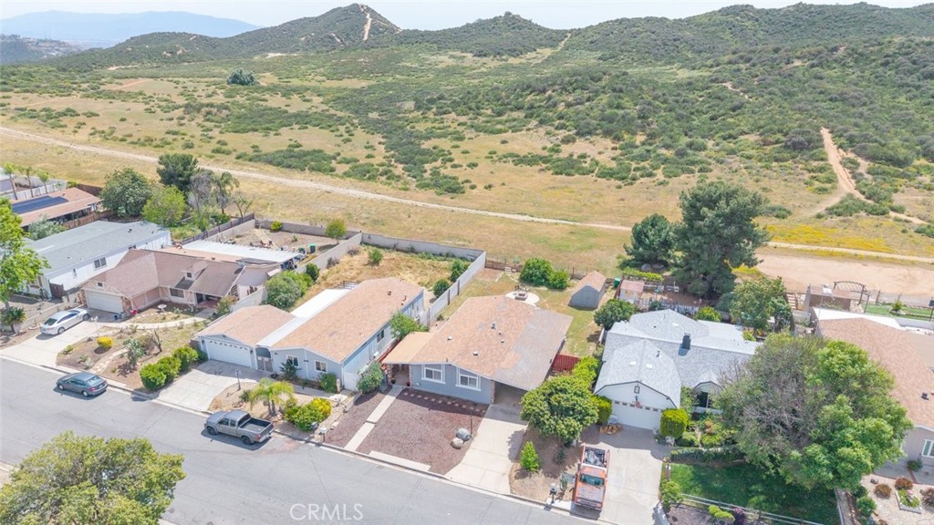 24799 Split Rail Road Wildomar, CA 92595 - Photo 20 of 37 an aerial view of residential houses with outdoor space
