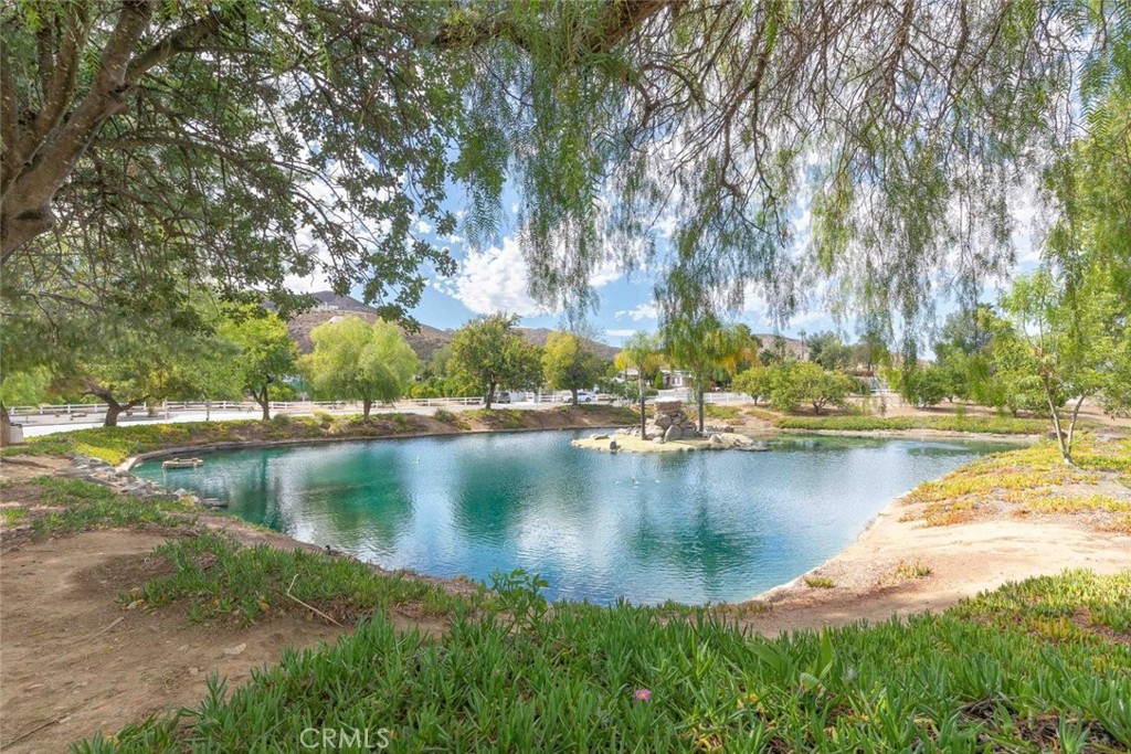 24799 Split Rail Road Wildomar, CA 92595 - Photo 24 of 37 a view of a lake with houses with outdoor space