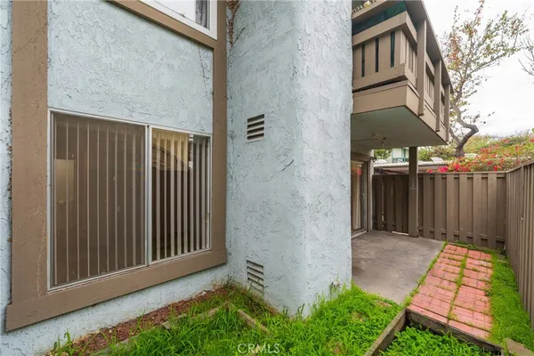 a view of a backyard of the house