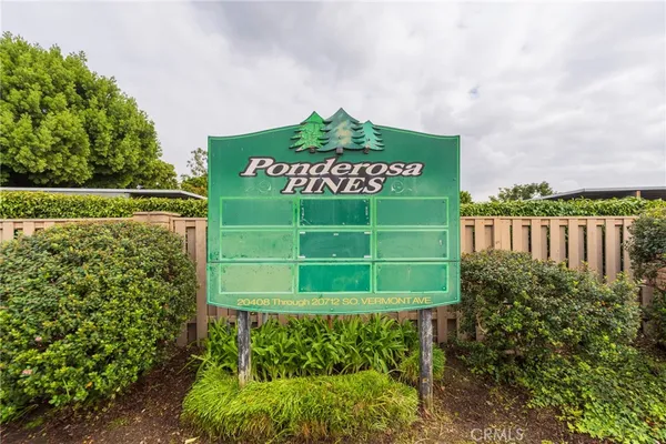 a view of a sign on the side of a building