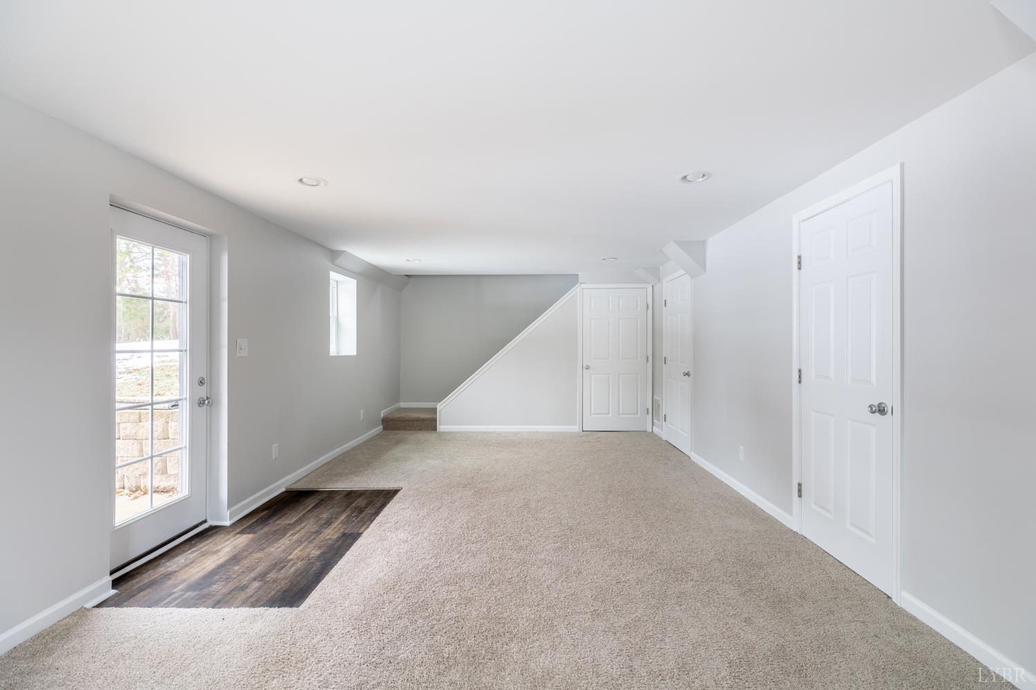3538 Gladys Road Gladys, VA 24554 - Photo 47 of 81 a view of an empty room with wooden floor and a window