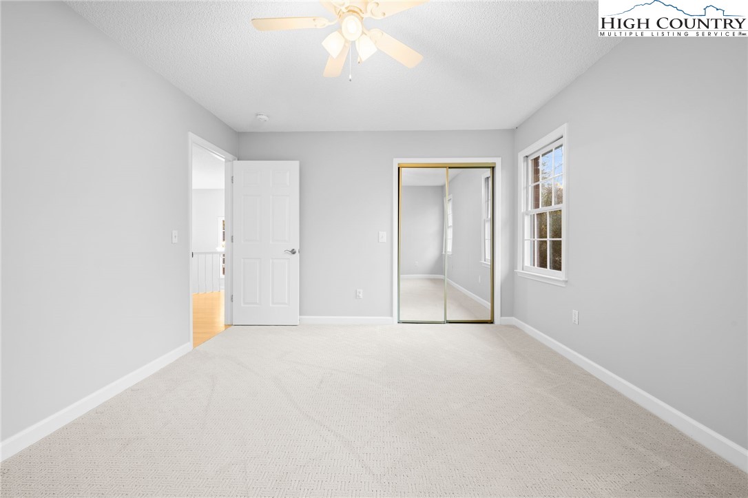 458 Jim Caudill Road Wilkesboro, NC 28697 - Photo 27 of 50 an empty room with fan