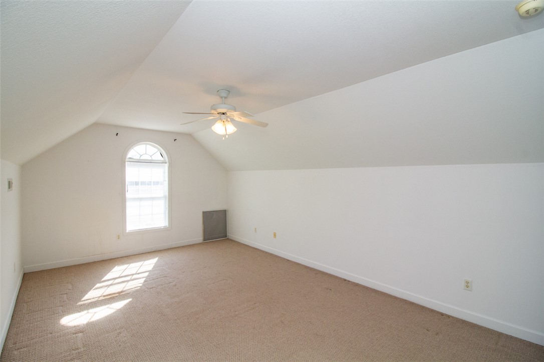 735 Britton Street Anderson, SC 29621 - Photo 39 of 50 This spacious Bonus room features vaulted ceilings and ample natural light, perfect for any use.