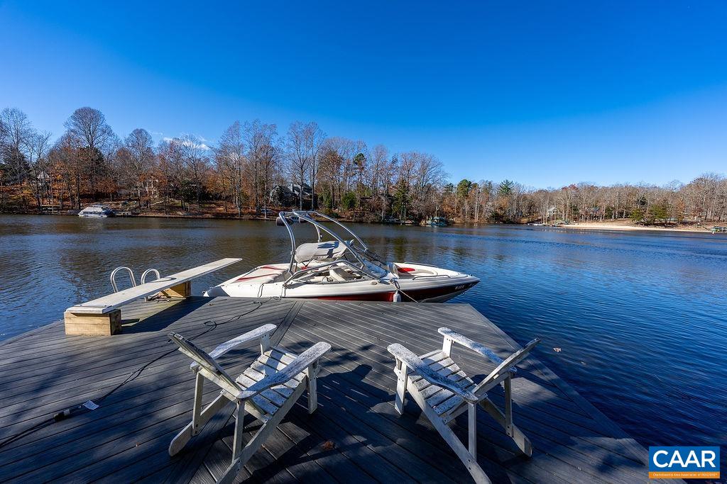 75 Amethyst Road Palmyra, VA 22963 - Photo 16 of 42 a view of a lake with sitting area