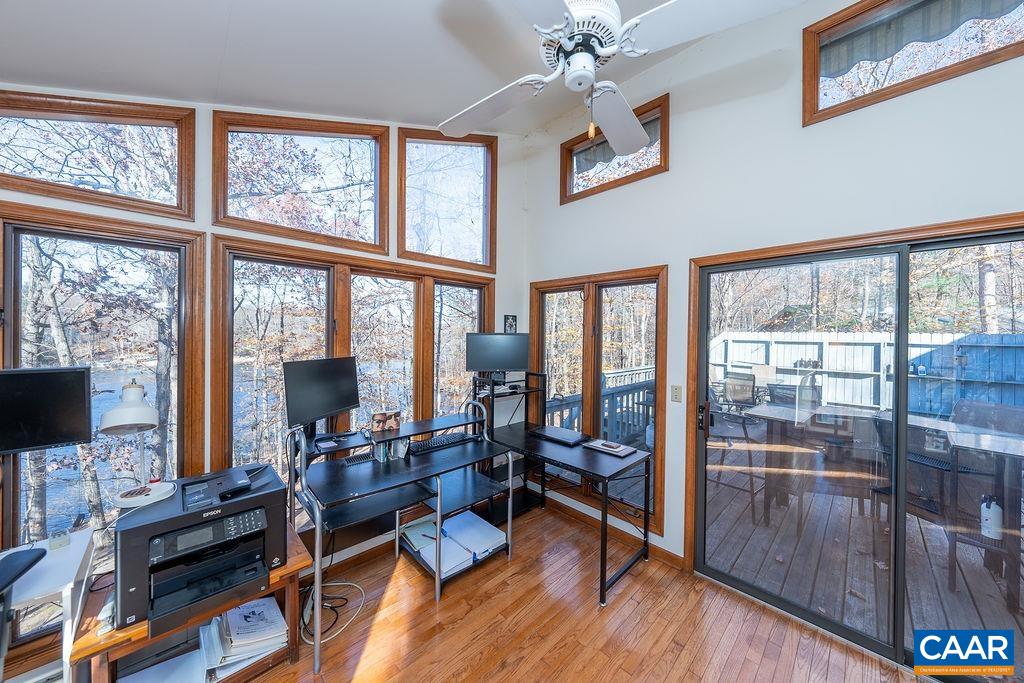 75 Amethyst Road Palmyra, VA 22963 - Photo 30 of 42 a living room with furniture fireplace and flat screen tv