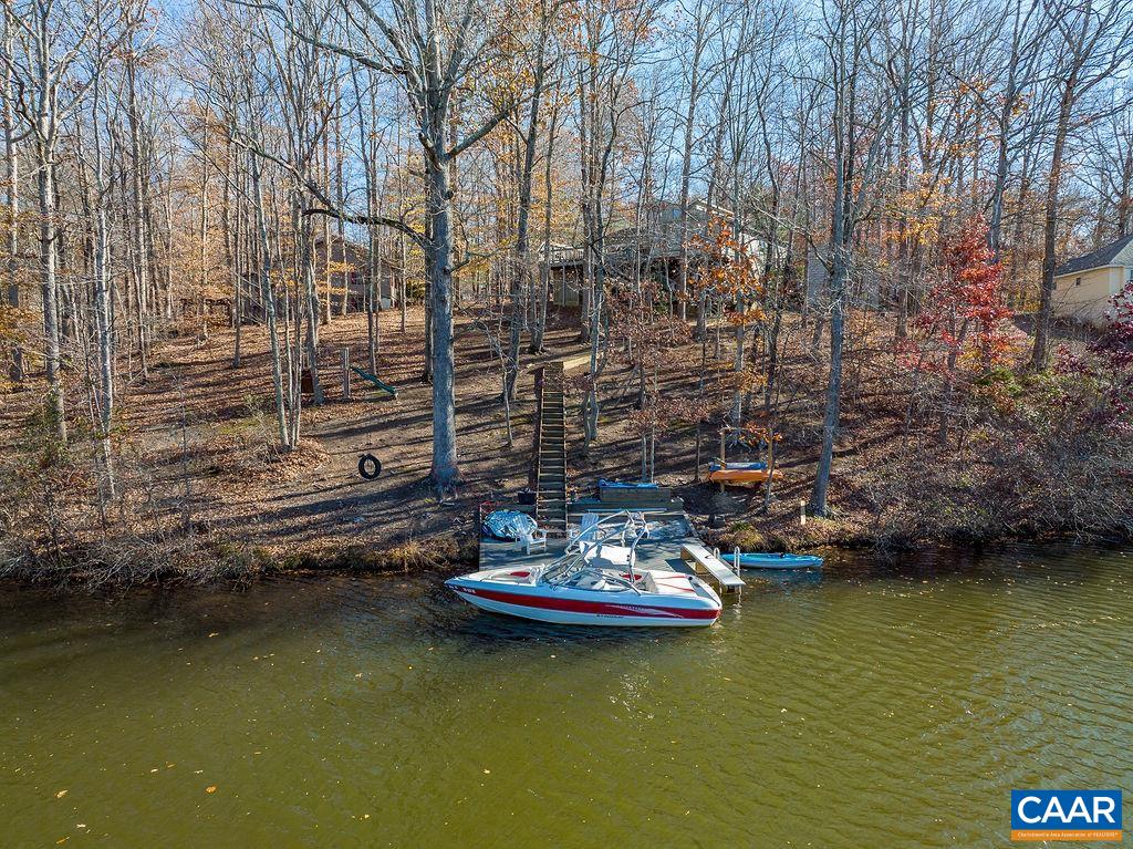 75 Amethyst Road Palmyra, VA 22963 - Photo 4 of 42 a view of a water with boats and trees