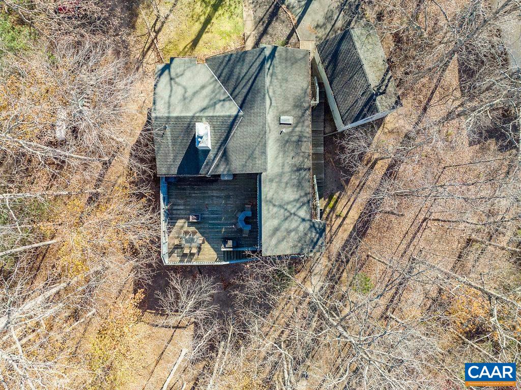 75 Amethyst Road Palmyra, VA 22963 - Photo 6 of 42 a view of a stone house with a large tree
