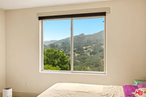 a view of a closet with storage