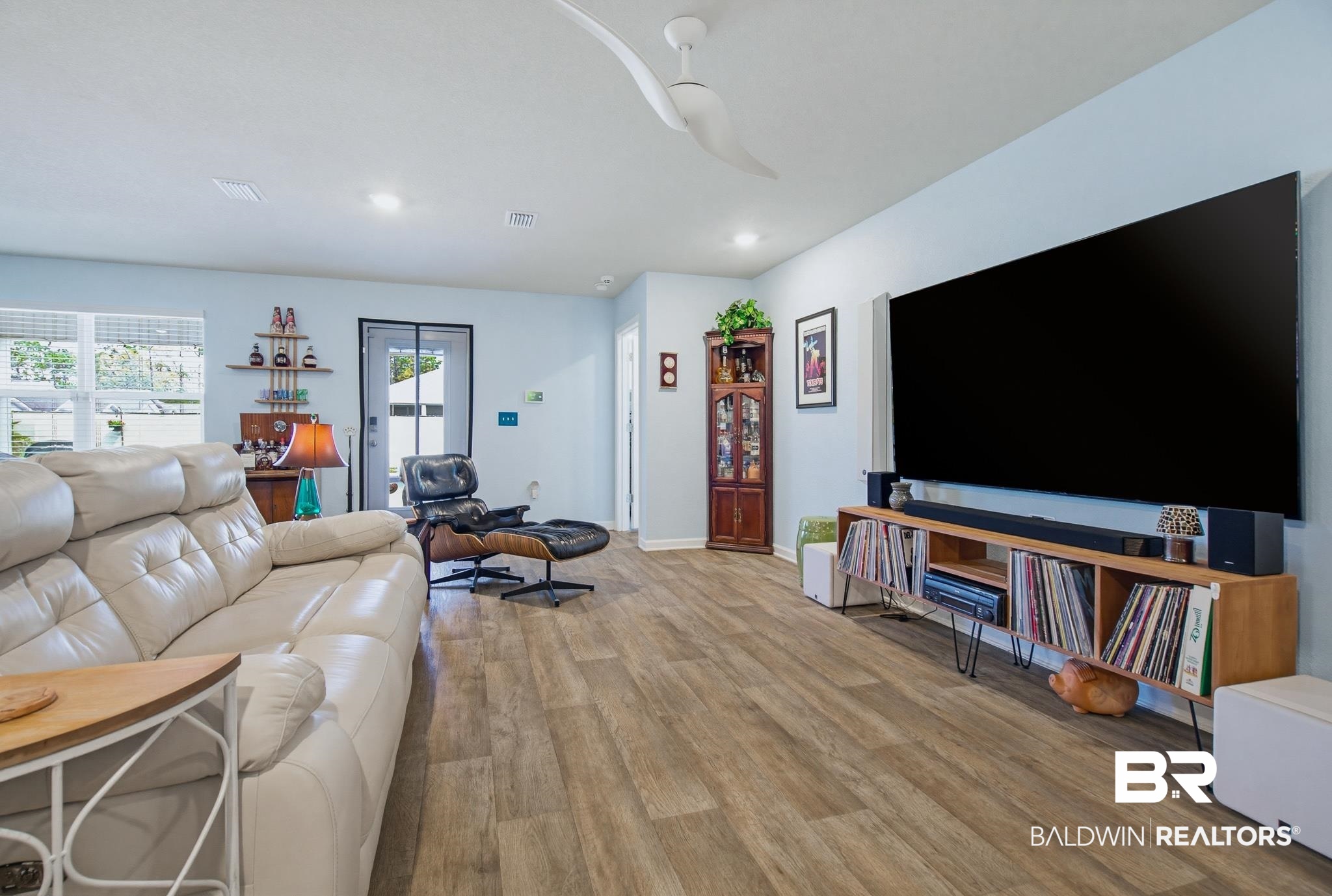 261 Fulham Lane Foley, AL 36535 - Photo 32 of 50 Living area featuring light wood-type flooring and recessed lighting