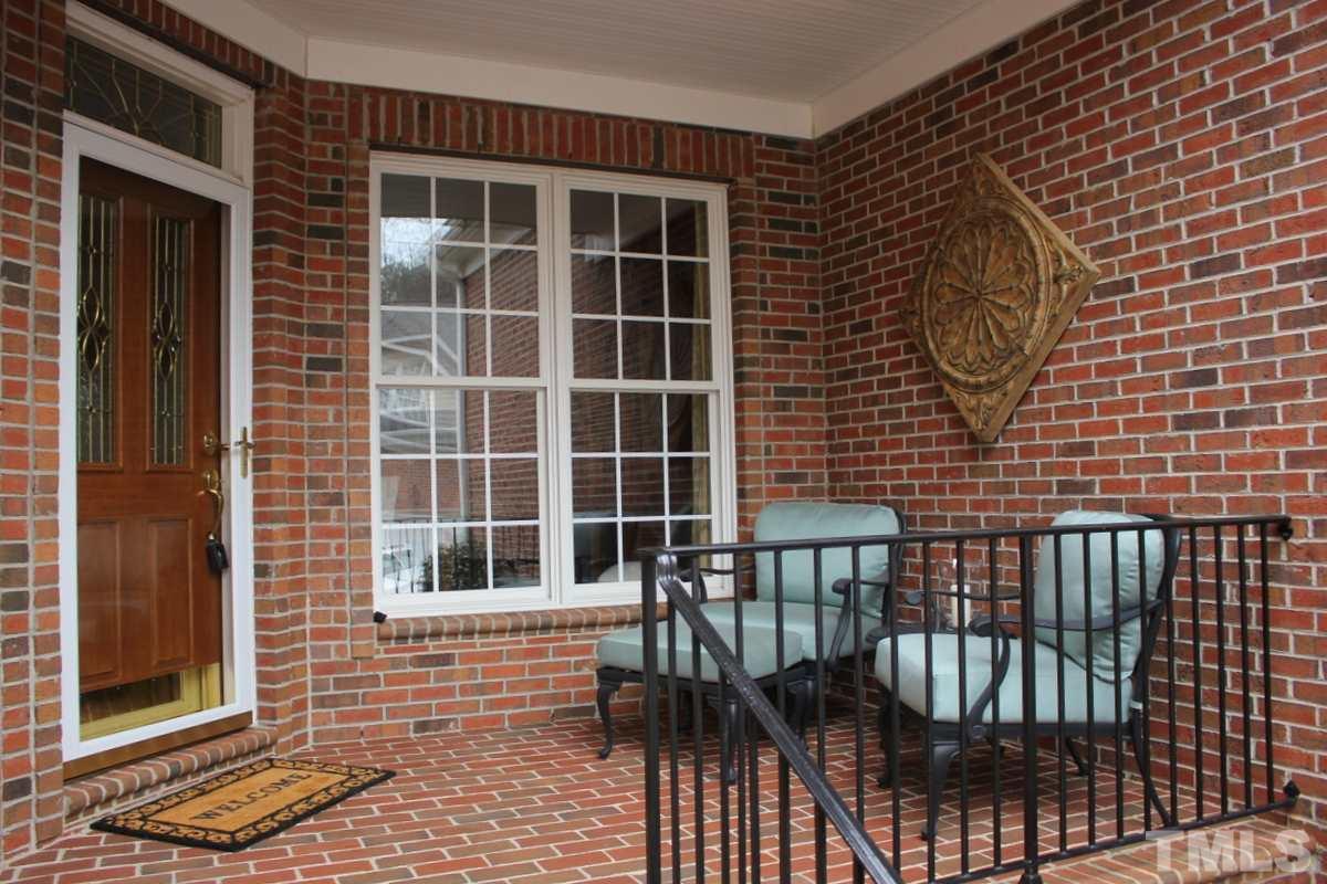 7405 Fontana Ridge Lane Raleigh, NC 27613 - Photo 2 of 25 a front view of a house with a window