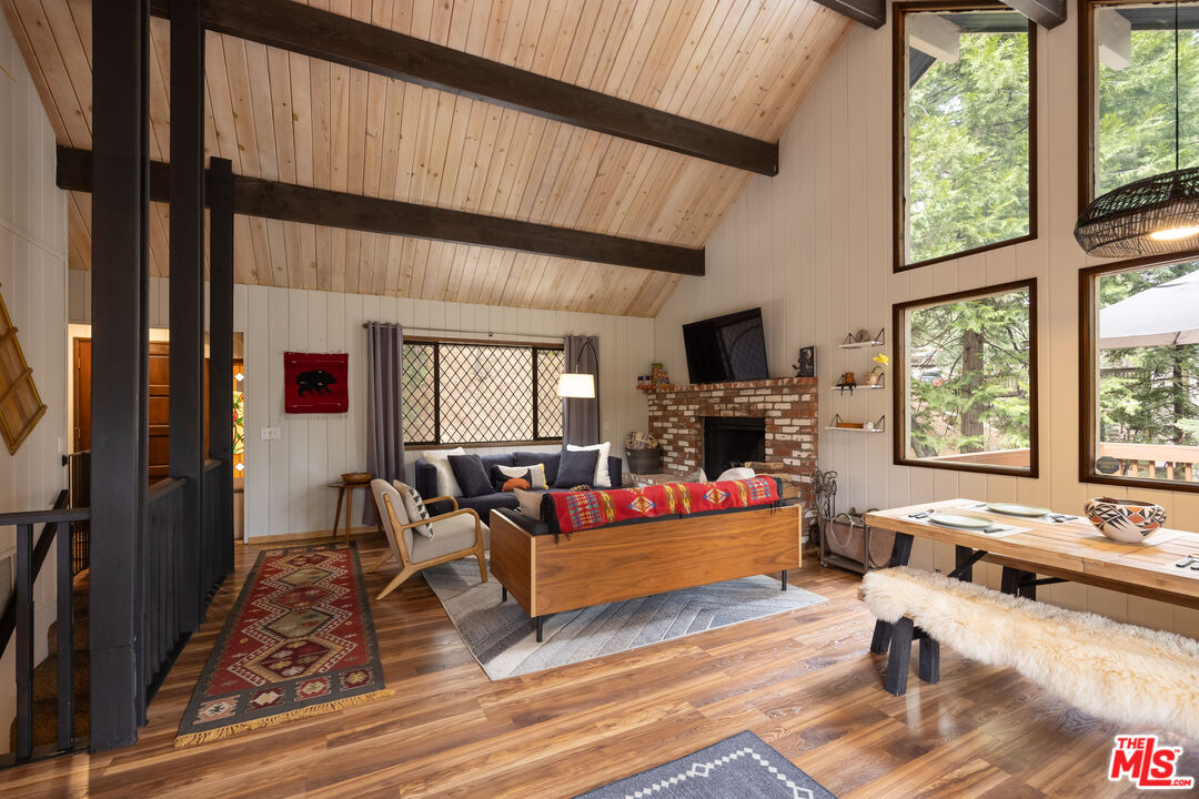 26645 Lake Forest Drive Twin Peaks, CA 92391 - Photo 12 of 30 a living room with furniture fireplace and flat screen tv