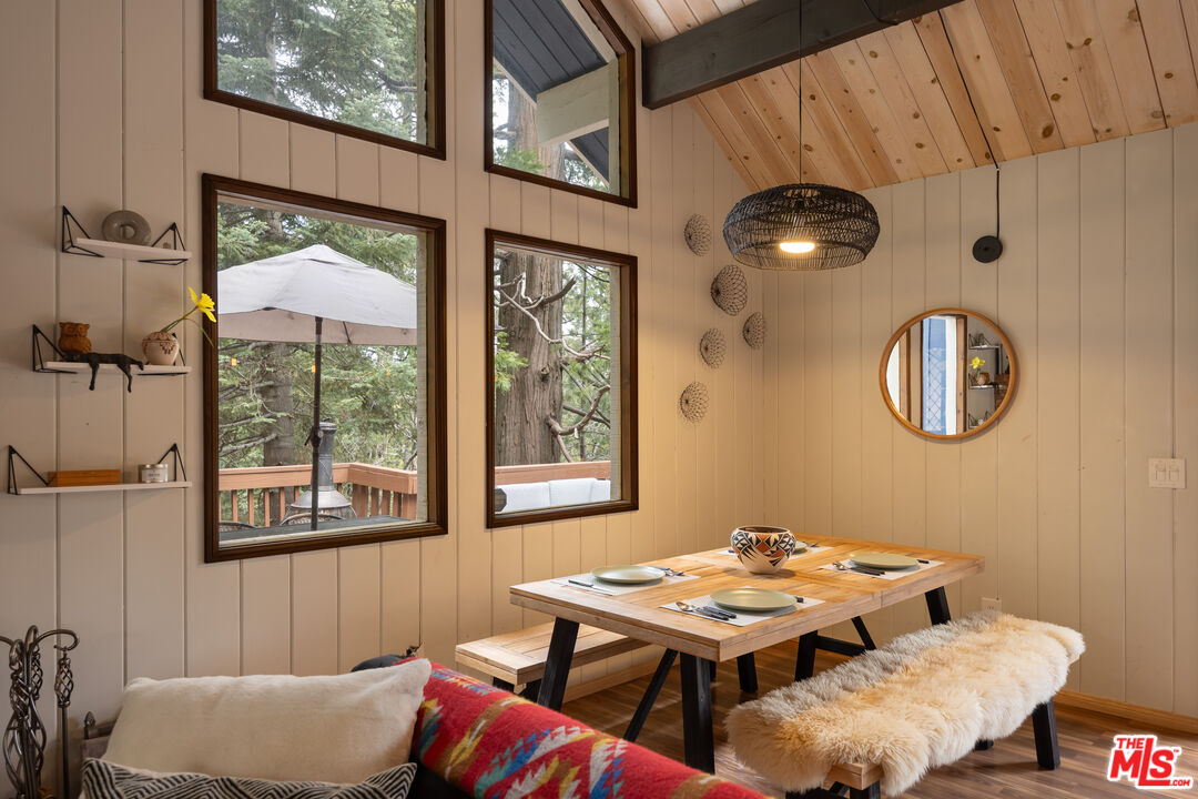 26645 Lake Forest Drive Twin Peaks, CA 92391 - Photo 13 of 30 a dining room with furniture and a large window
