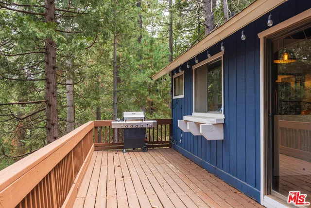 a view of balcony with furniture