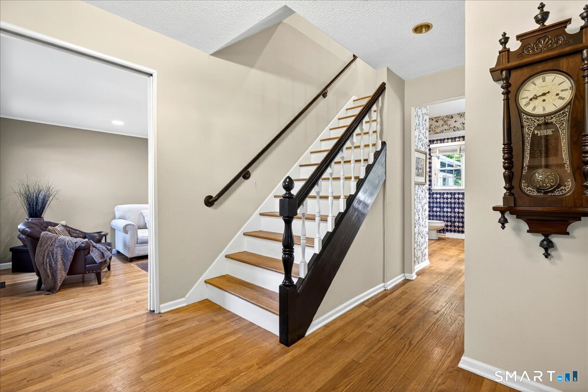 11 Bender Road Hamden, CT 06518 - Photo 2 of 40 a view of entryway and hall with wooden floor
