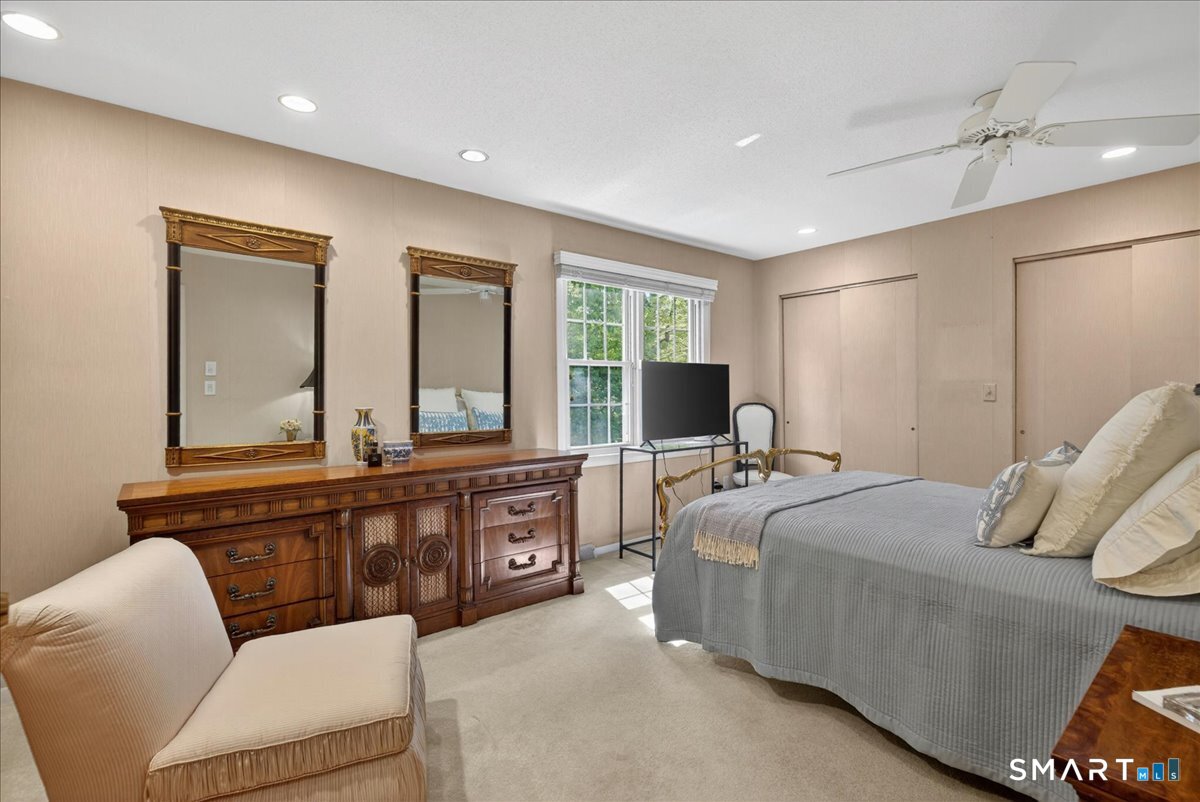 11 Bender Road Hamden, CT 06518 - Photo 21 of 40 a bed room with a bed and a couch
