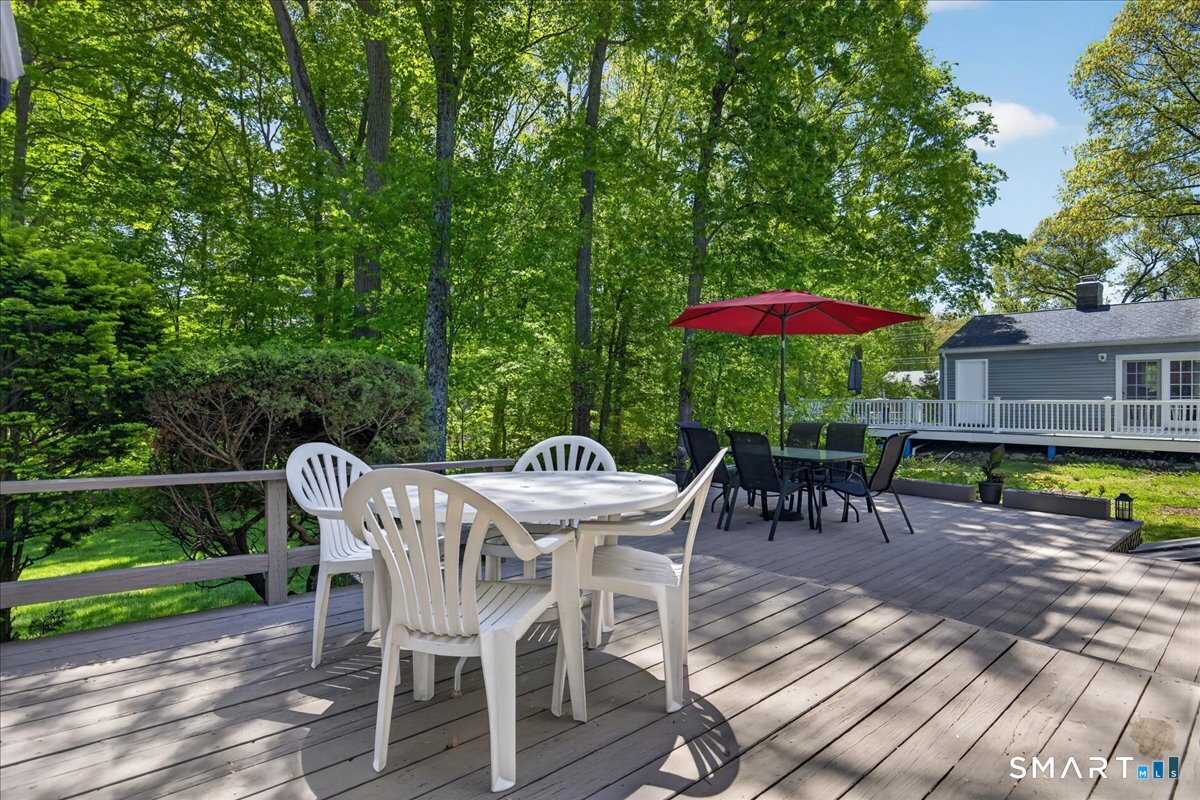 11 Bender Road Hamden, CT 06518 - Photo 29 of 40 a view of a table and chairs in patio