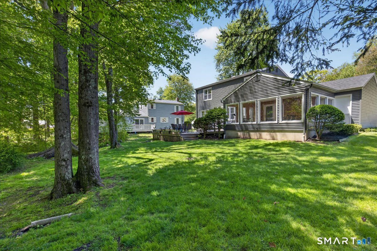 11 Bender Road Hamden, CT 06518 - Photo 33 of 40 a front view of a house with garden