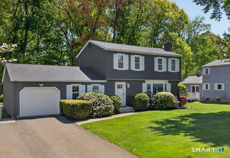 11 Bender Road Hamden, CT 06518 - Photo 37 of 40 a front view of a house with a yard