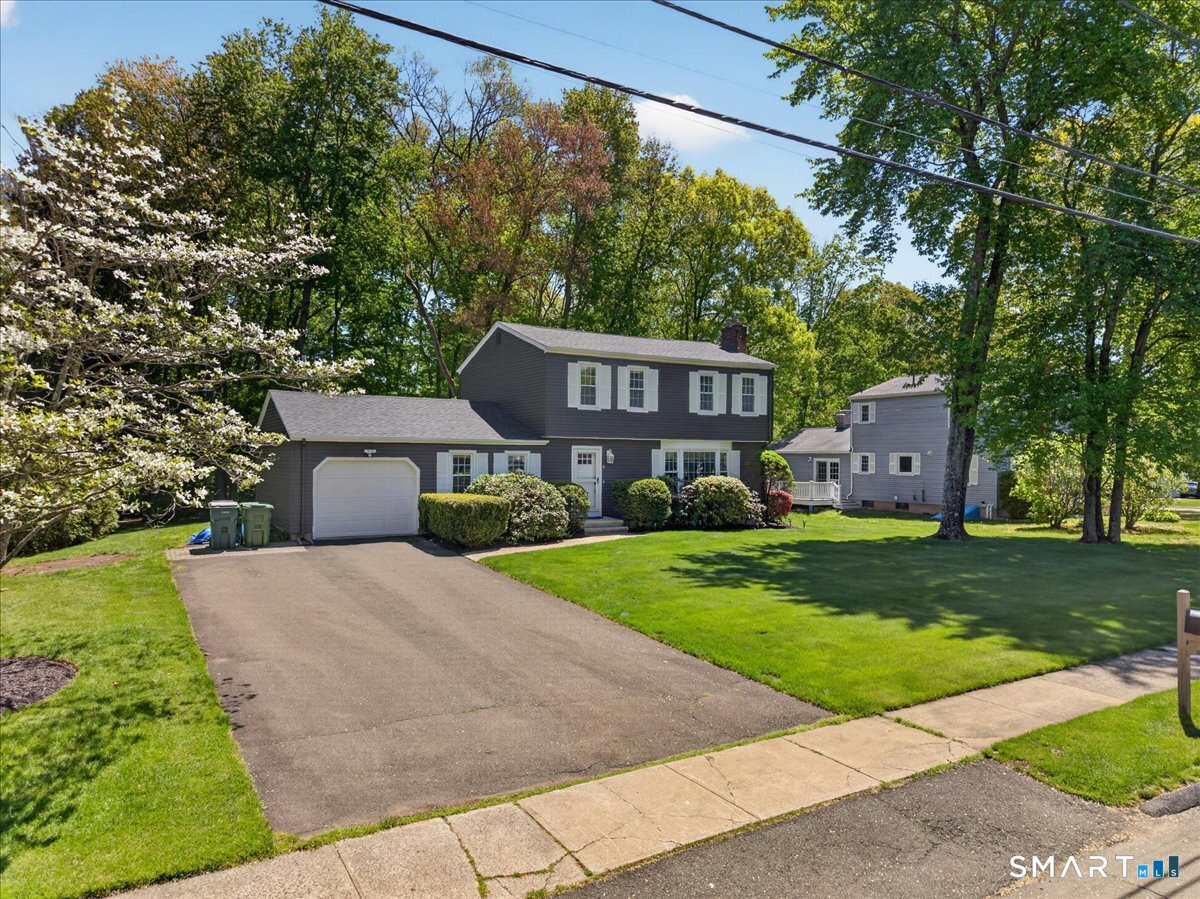 11 Bender Road Hamden, CT 06518 - Photo 38 of 40 a front view of a house with garden