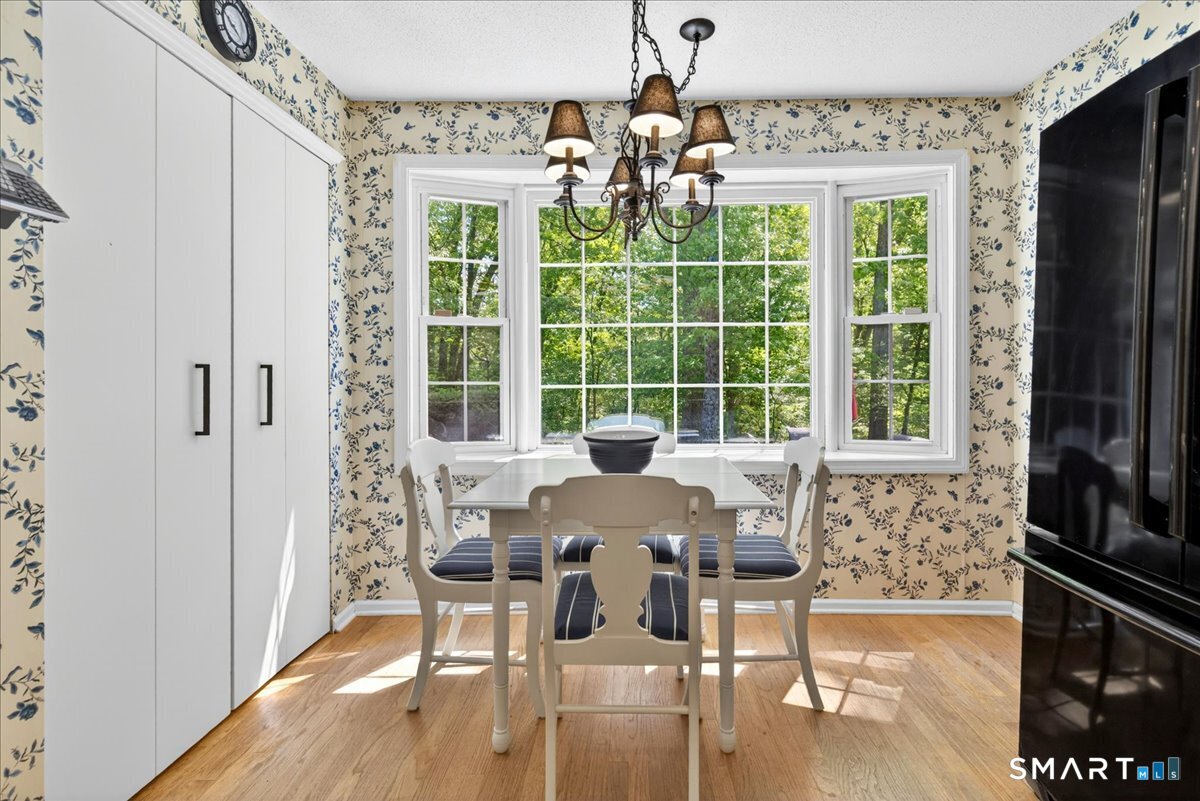 11 Bender Road Hamden, CT 06518 - Photo 10 of 40 a view of a dining room with furniture window and outside view