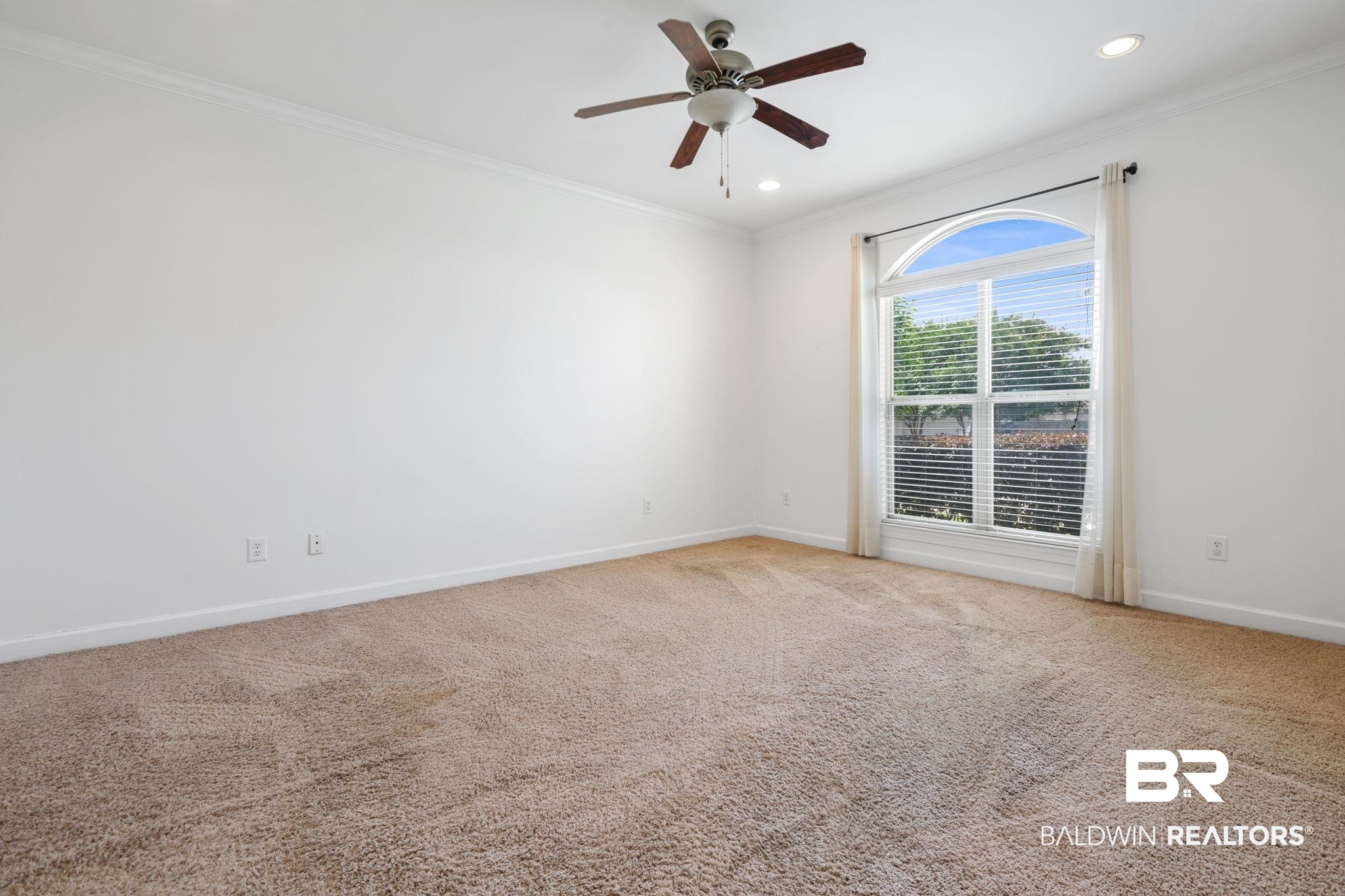 9730 Harmony Ridge Circle West Semmes, AL 36575 - Photo 13 of 38 Unfurnished room featuring ornamental molding, a ceiling fan, baseboards, carpet, and recessed lighting