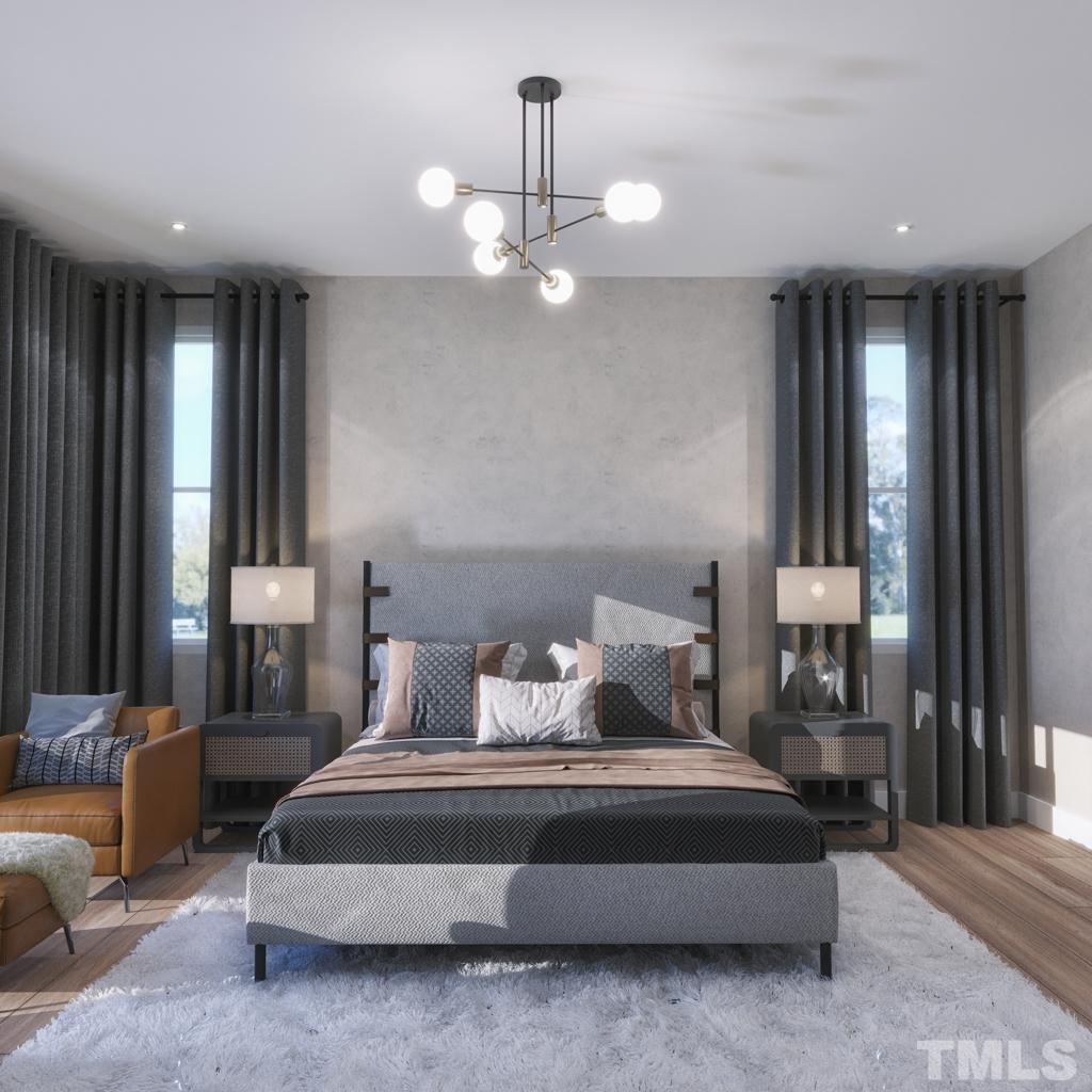 47 Treviso Place Durham, NC 27707 - Photo 11 of 38 a bedroom with bed and window