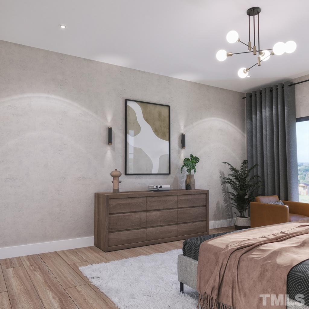 47 Treviso Place Durham, NC 27707 - Photo 14 of 38 a bedroom with bed and a chandelier