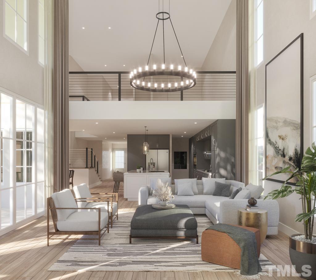 47 Treviso Place Durham, NC 27707 - Photo 16 of 38 a living room with furniture chandelier and a large mirror
