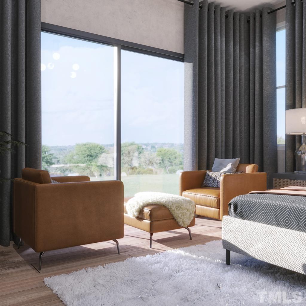 47 Treviso Place Durham, NC 27707 - Photo 17 of 38 a living room with furniture and a large window