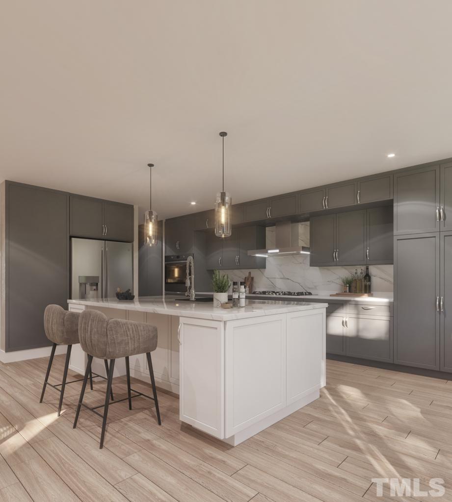 47 Treviso Place Durham, NC 27707 - Photo 21 of 38 a kitchen with stainless steel appliances granite countertop a sink stove and wooden floor
