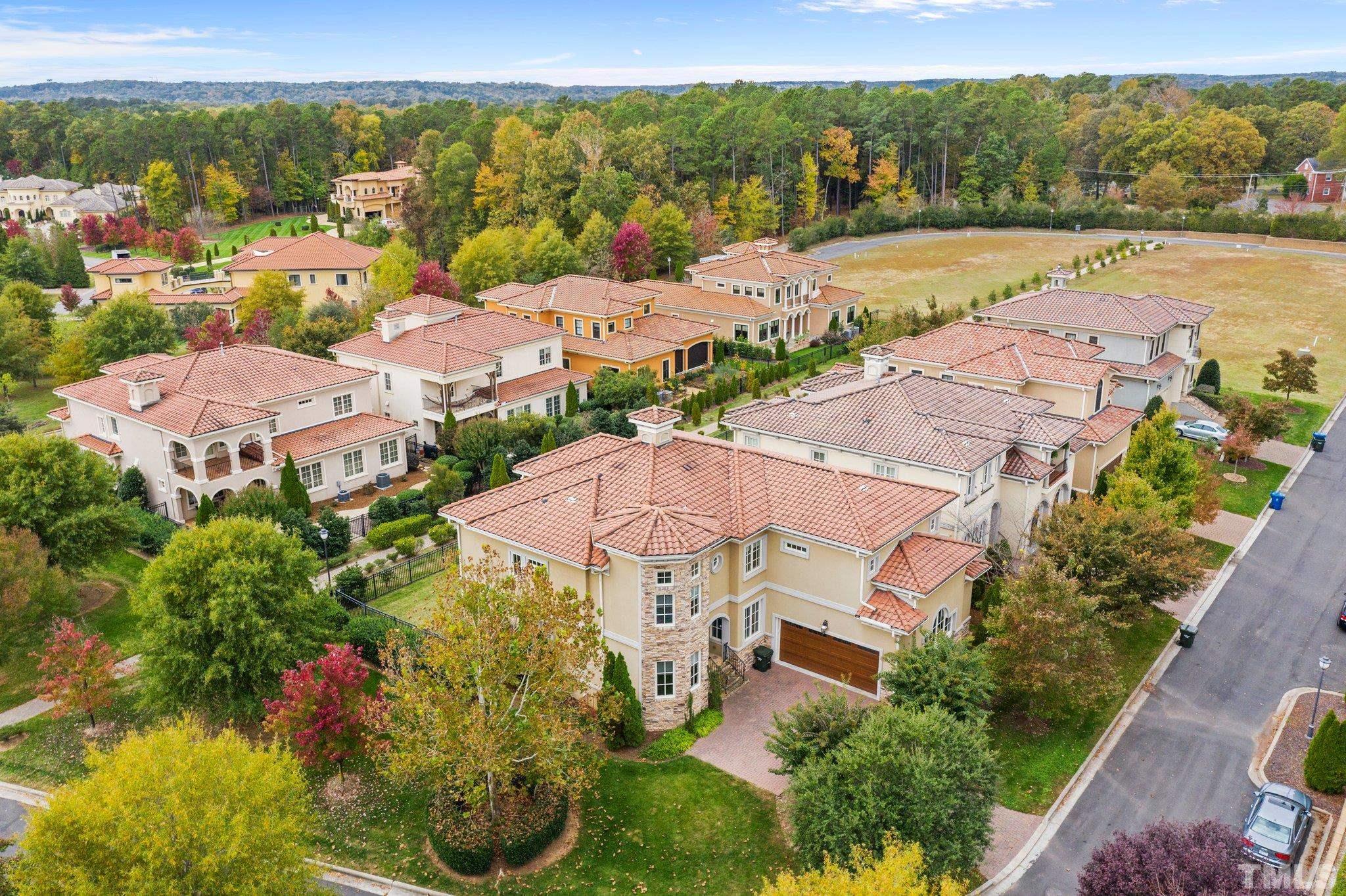 47 Treviso Place Durham, NC 27707 - Photo 31 of 38 an aerial view of residential houses with outdoor space and ocean view
