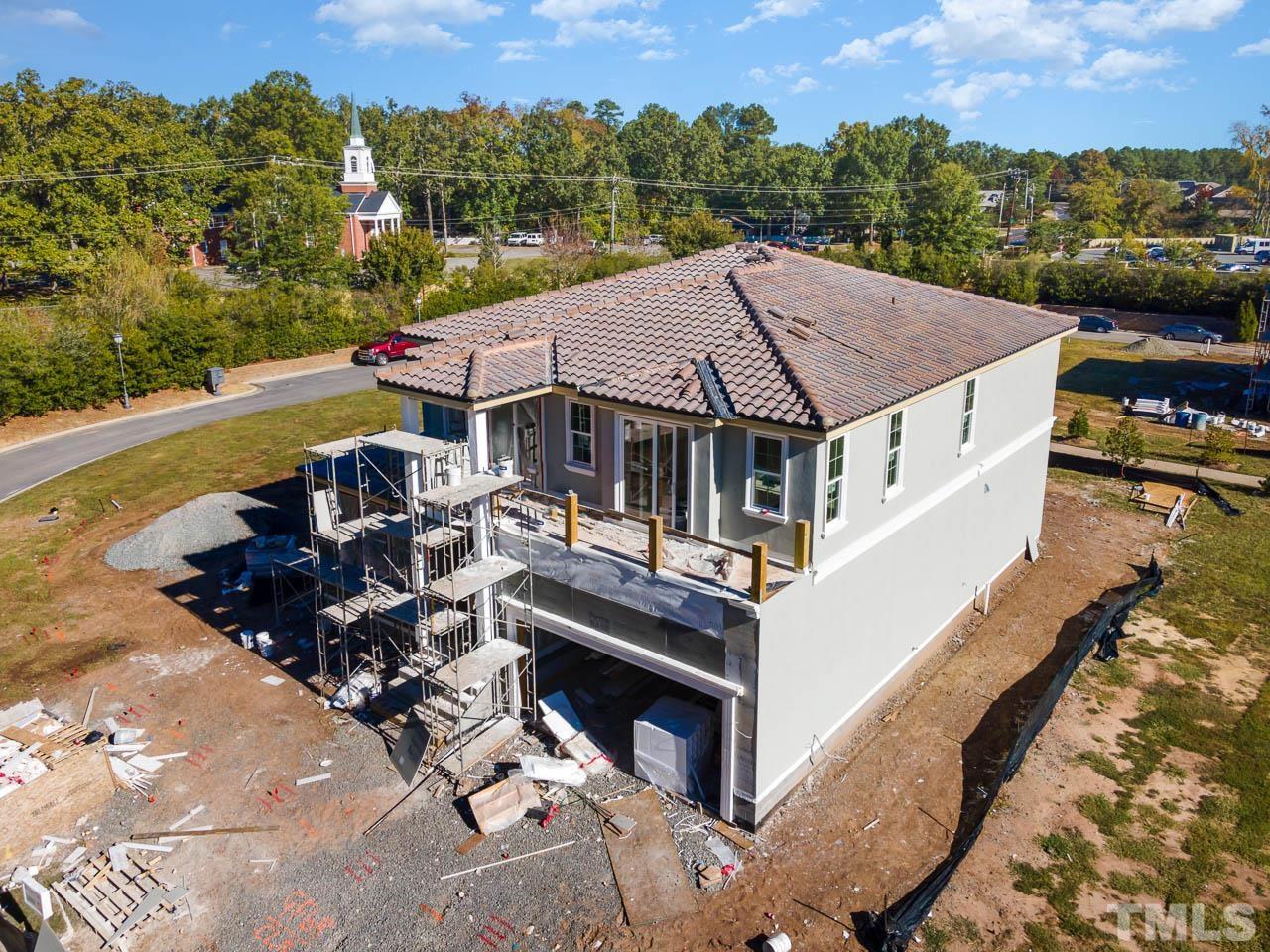 47 Treviso Place Durham, NC 27707 - Photo 33 of 38 a aerial view of a house with a patio