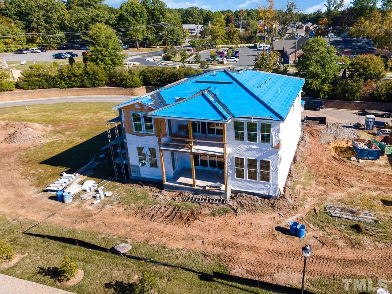 47 Treviso Place Durham, NC 27707 - Photo 35 of 38 a aerial view of a house with a yard
