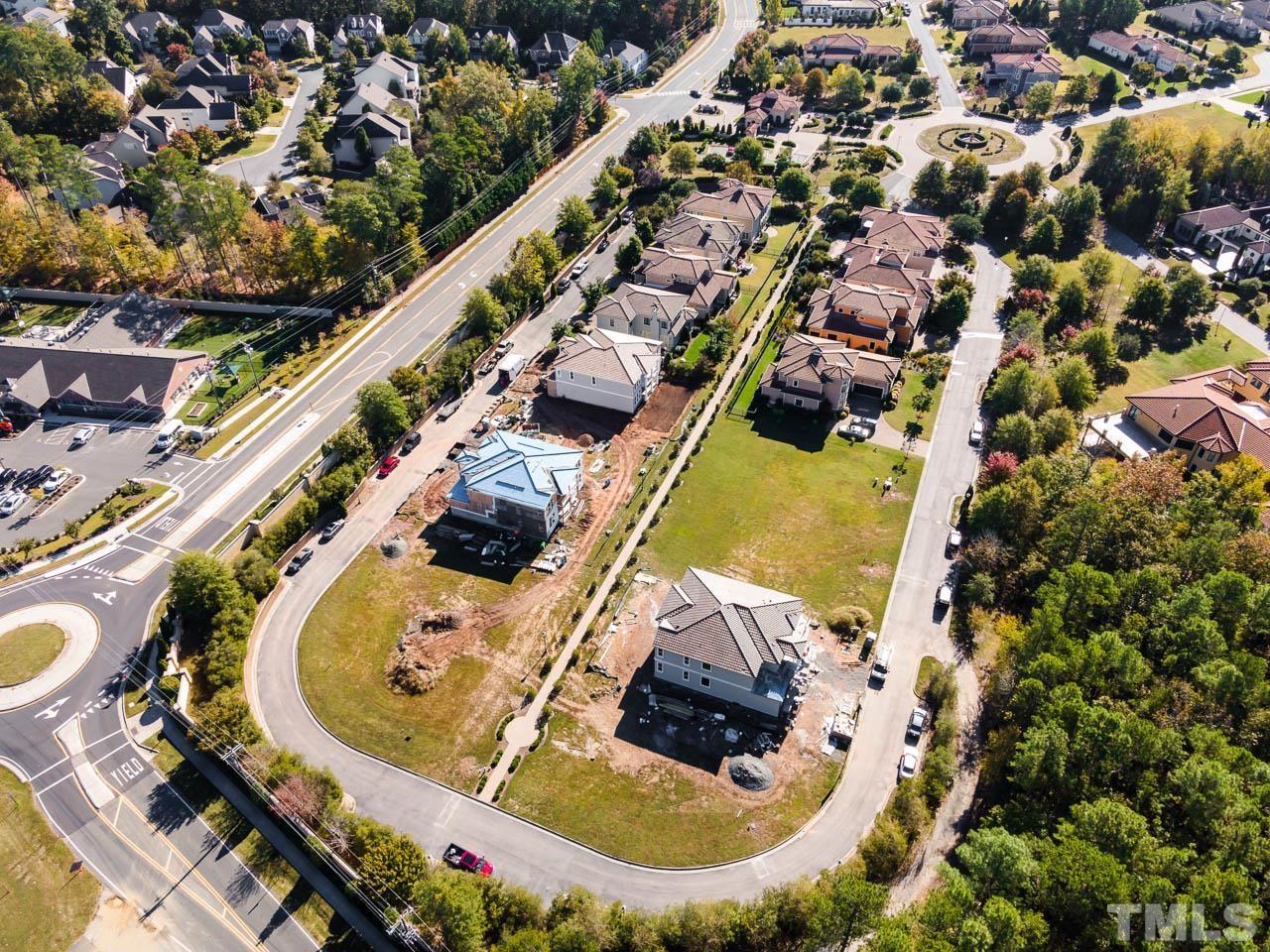 47 Treviso Place Durham, NC 27707 - Photo 37 of 38 an aerial view of a house with a swimming pool and outdoor seating