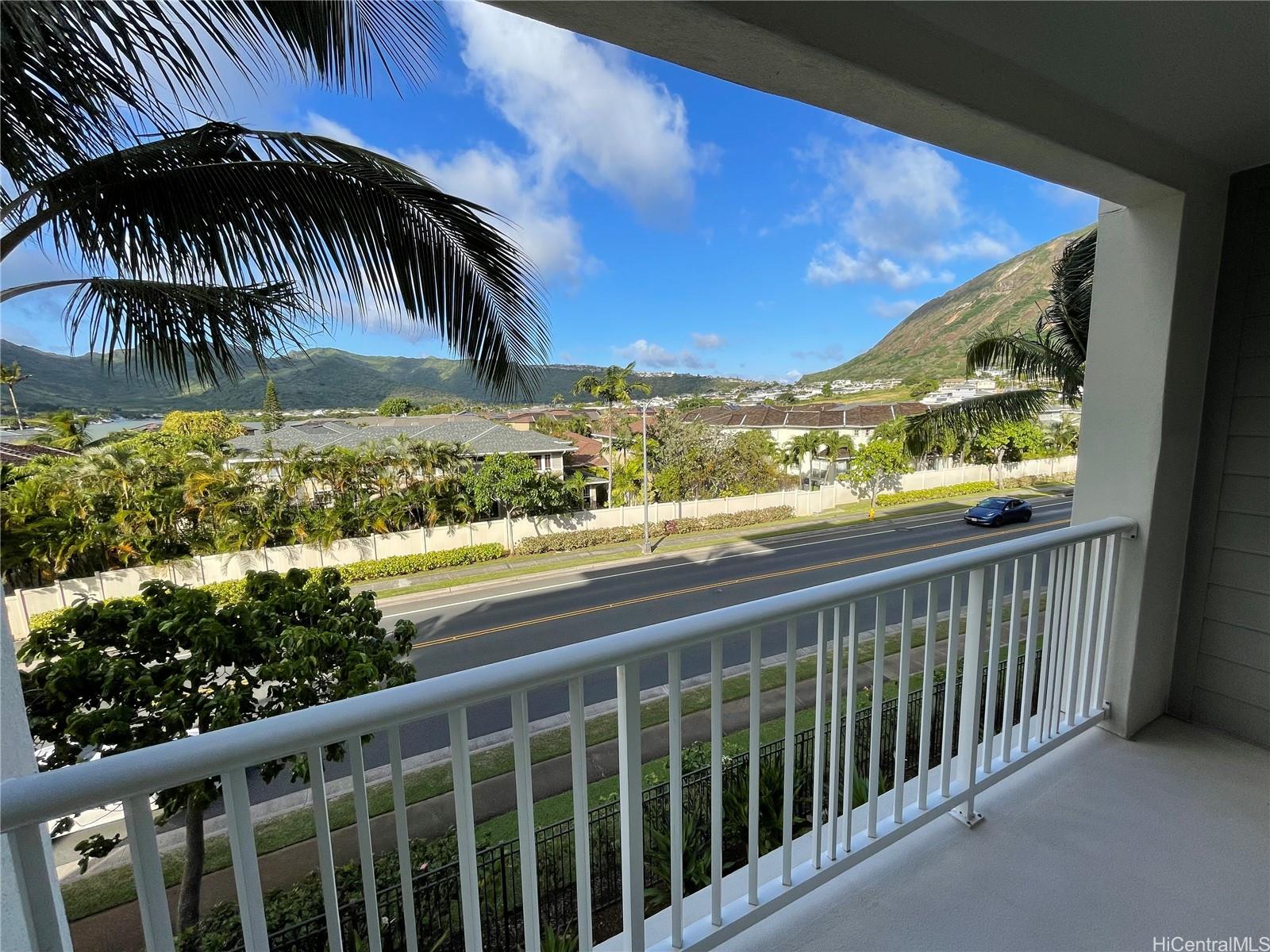 520 Lunalilo Home Road, Unit 8225 Honolulu, HI 96825 - Photo 16 of 25 a view of balcony with wooden floor and outdoor space