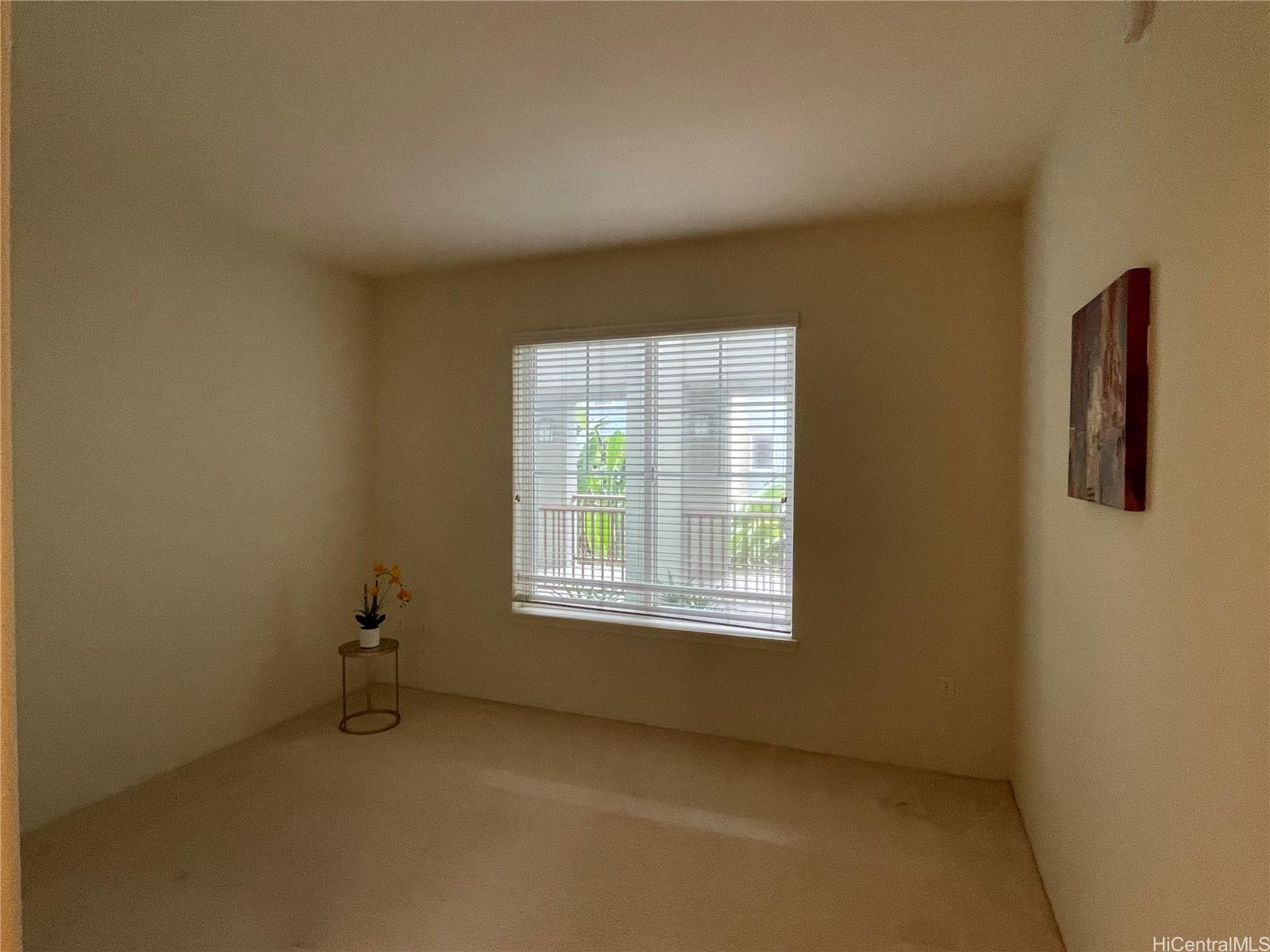 520 Lunalilo Home Road, Unit 8225 Honolulu, HI 96825 - Photo 20 of 25 an empty room with windows