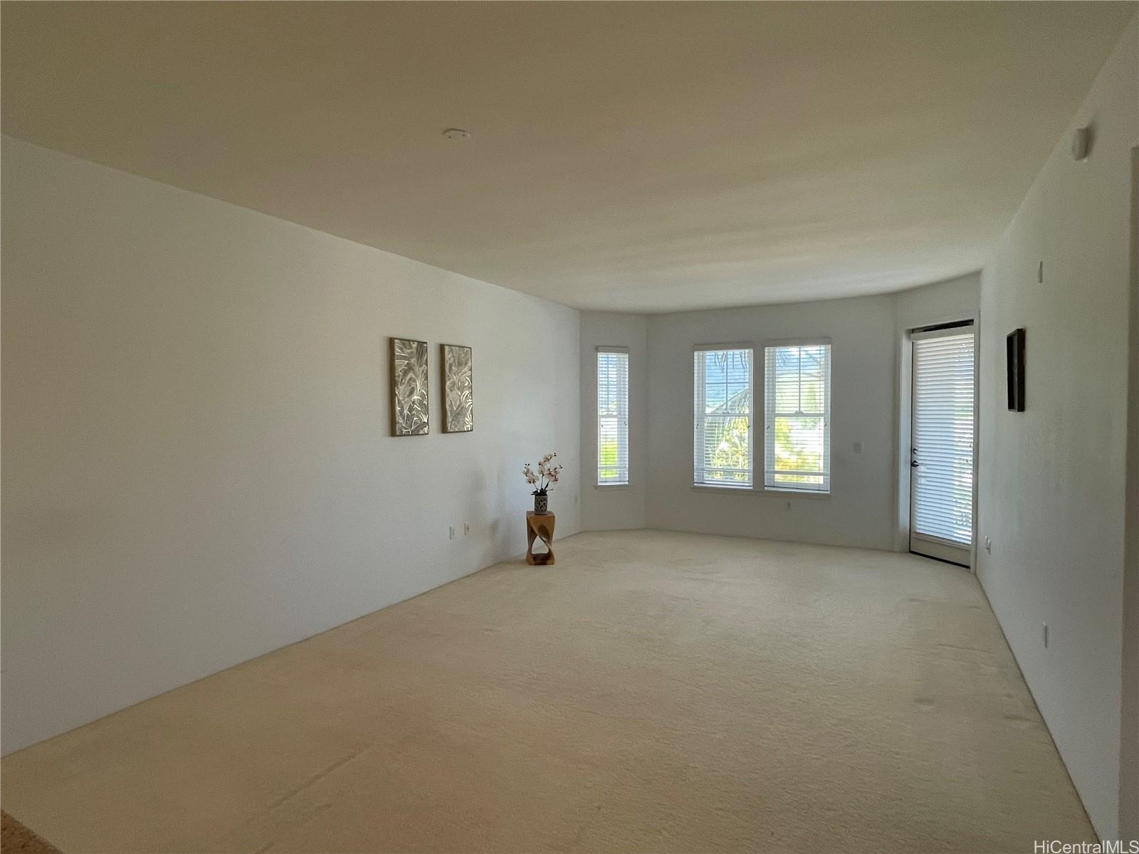 520 Lunalilo Home Road, Unit 8225 Honolulu, HI 96825 - Photo 6 of 25 a view of an empty room with a window