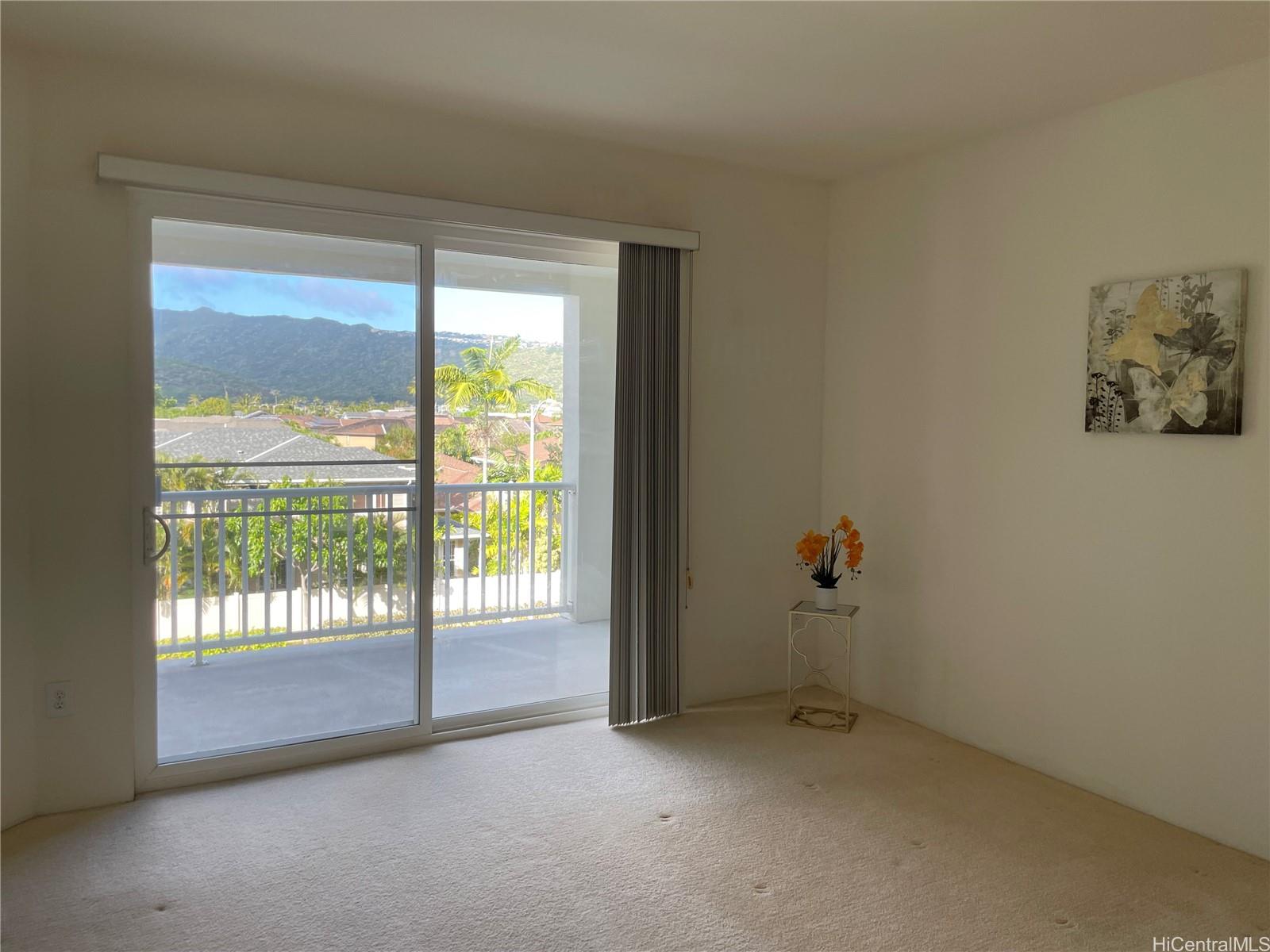 520 Lunalilo Home Road, Unit 8225 Honolulu, HI 96825 - Photo 8 of 25 a view of an empty room with a window