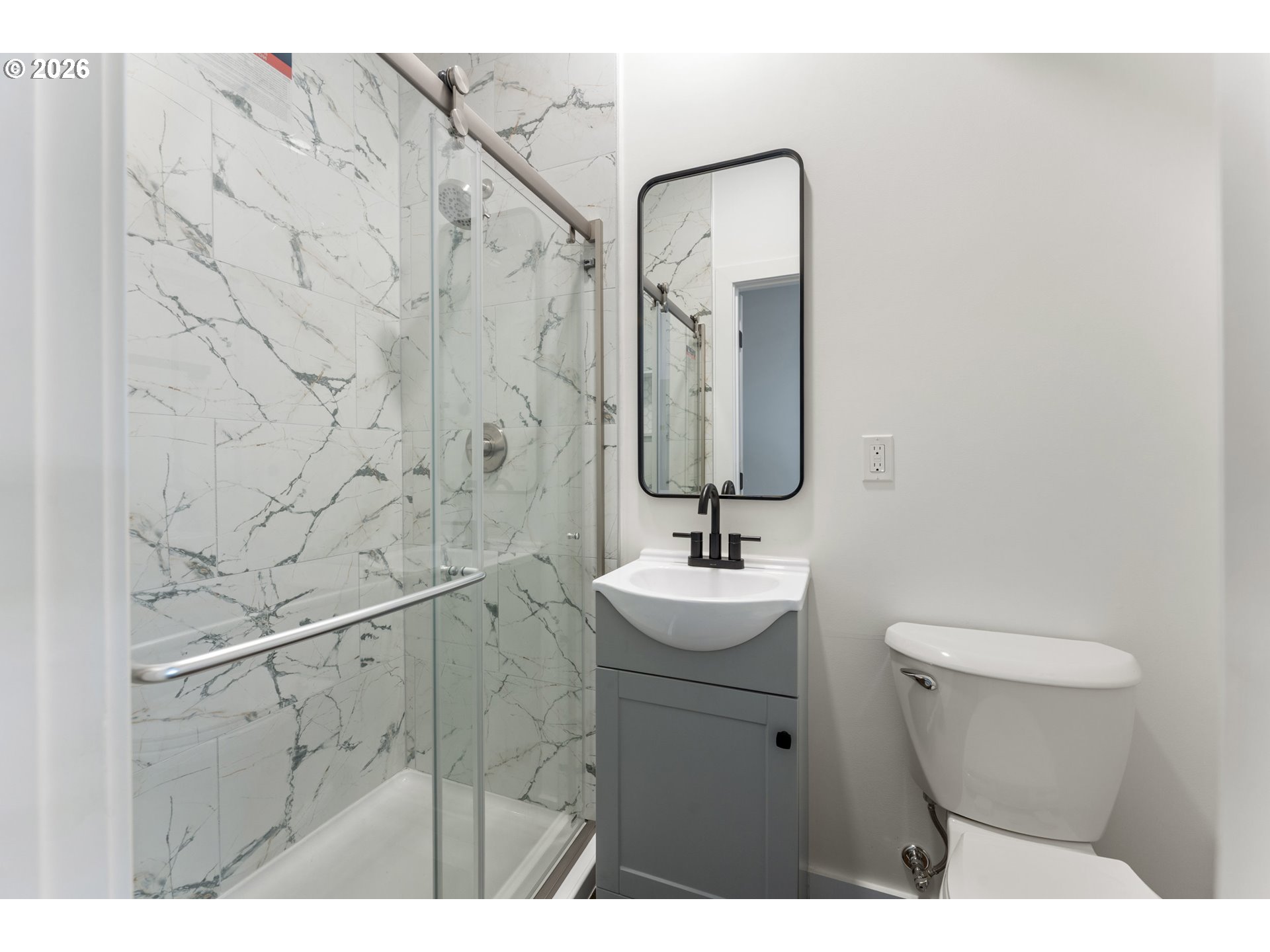 413 South Trade Street Amity, OR 97101 - Photo 18 of 42 a bathroom with a toilet sink and mirror