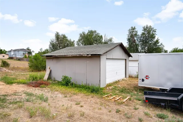 a backyard of a house with lots of green space