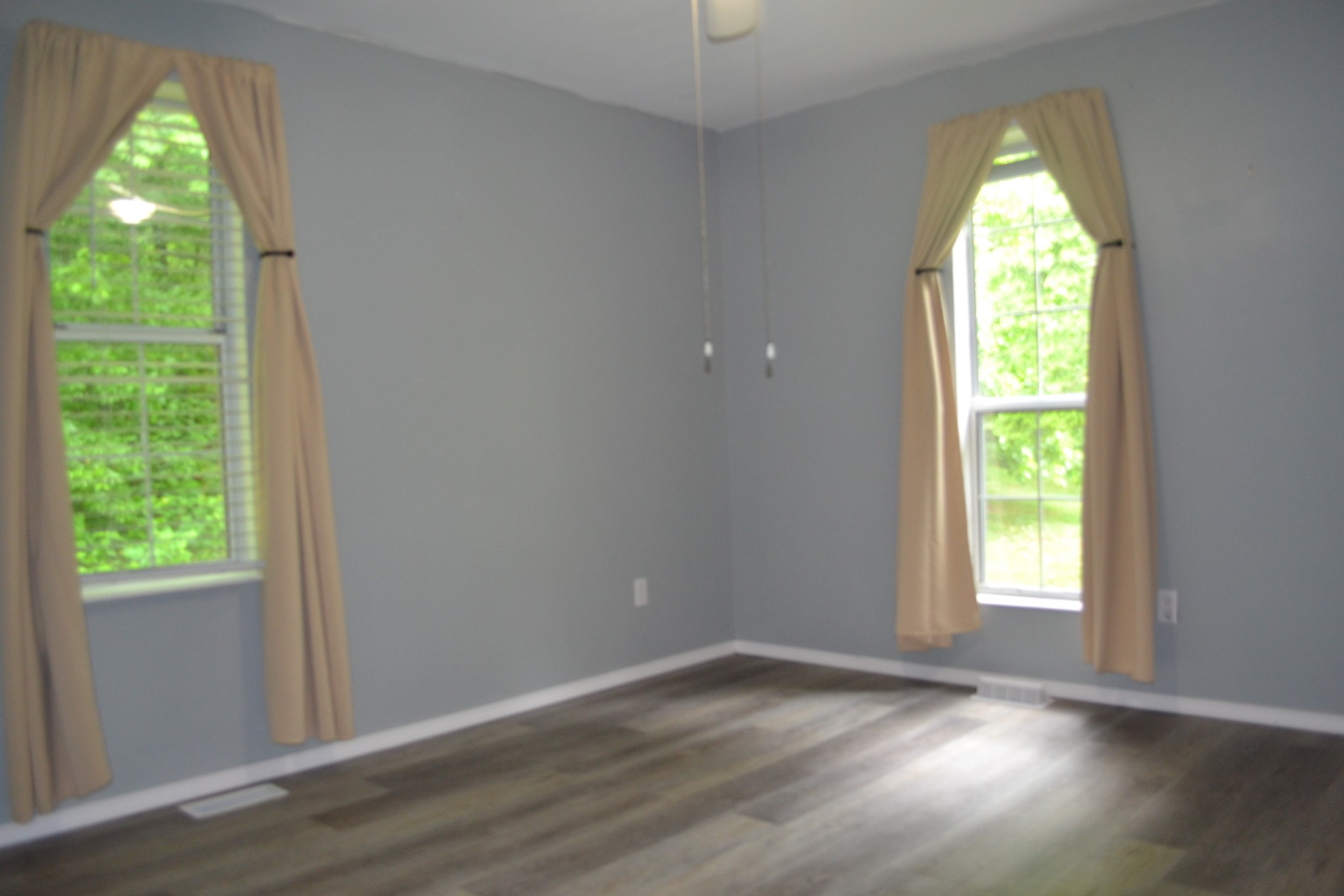 1505 Add Stafford Road Hilham, TN 38568 - Photo 10 of 65 a view of empty room with wooden floor and walls