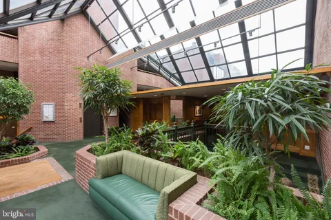 a view of a couches in patio of a house